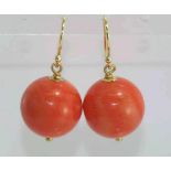 Pink-red coral bead earrings