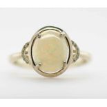 Silver and solid opal ring