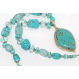 Turquoise and glass necklace with large pendant