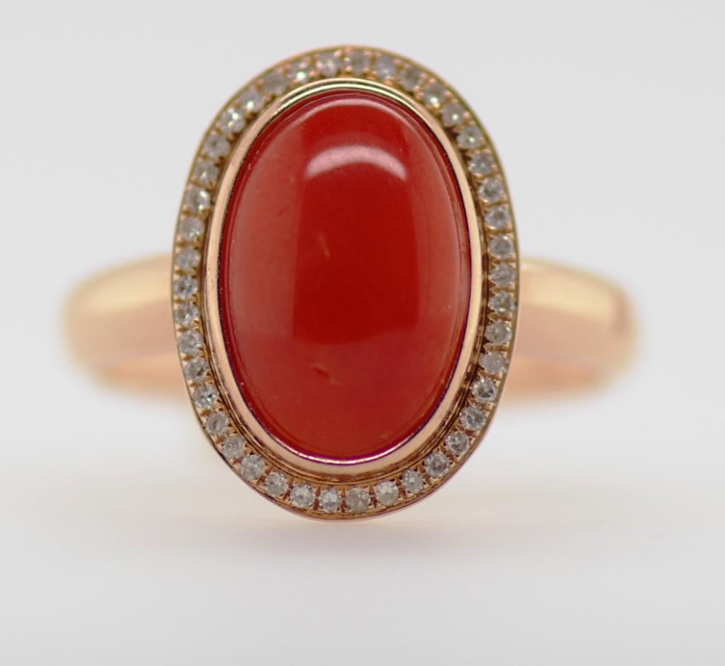 18ct yellow gold, oval coral and diamond ring