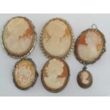 Six various sized vintage cameo brooches