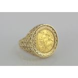 Hallmarked 9ct gold ring set with half sovereign