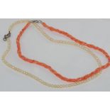 Two necklaces (pearl and coral)