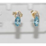 Delicate 14ct yellow gold, topaz and diamond studs