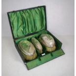 Cased George V sterling silver brush set