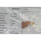 Unset seven hessonite garnet (7.08ct)