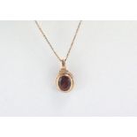 Vintage 9ct rose gold and garnet pendant