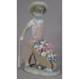 Lladro boy with wheelbarrow figure