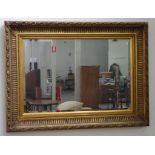 Gilt framed wall mirror