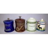 Four various vintage tobacco jars