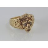 9ct gold, lion ring with diamond eyes