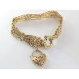 Vintage 9ct gate link bracelet with heart lock