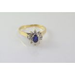 18ct two tone gold, sapphire &diamond cluster ring