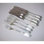 Eight pieces German silver dinner knives & forks