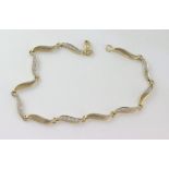 9ct yellow & white gold and diamond bracelet