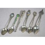 Five assorted silver souvenir spoons