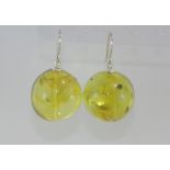 Green coloured Baltic amber earrings