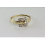 9ct gold and diamond buckle ring