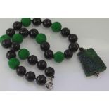 Oriental style green and black stone necklace