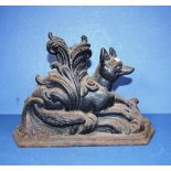 Vintage cast iron seated fox door stop