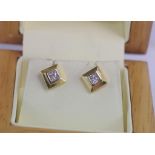 Boxed 18ct two tone gold and diamond studs