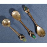 Three silver opal decorated condiment spoons