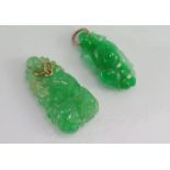 Two small carved jade pendants
