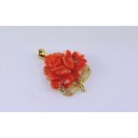 18ct gold, diamond and carved coral rose pendant