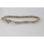 9ct two tone gold and diamond set bracelet