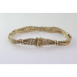 Interesting 9ct gold multi-strand bracelet