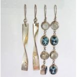 Two pairs of long dangling earrings