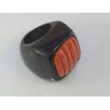 Ebony and carved red coral ring
