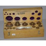 Vintage wood cased set brass weights