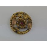 Vintage gold circular brooch