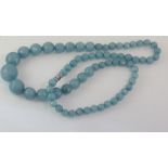 Graduate facetted aquamarine bead necklace