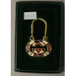 Gucci monogrammed gold plate & enamel key ring