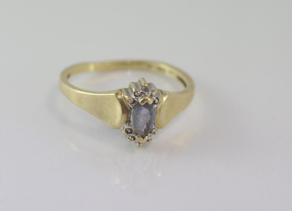 10ct yellow gold, blue paste and diamond ring