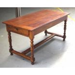 Antique French cherrywood stretcher base table