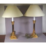 Pair of brass column base electric lamps