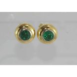 Good 18ct two tone gold and emerald studs