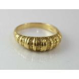 Yellow gold ring marked 18K