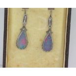 Opal drop earrings in 9ct white gold surround
