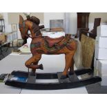 Carved wooden rocking horse