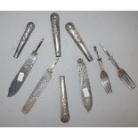 Four Edwardian sterling silver cutlery pieces