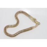 Unusual 9ct yellow gold flexible snake bracelet