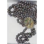 Boxed three strand pearl necklace with paua shell