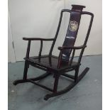 Oriental hardwood rocking chair