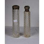 Two French silver topped crystal toilet jars