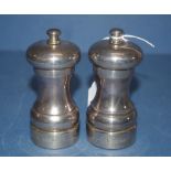 Two sterling silver pepper grinders