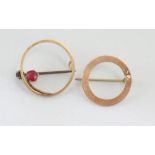 Two 9ct rose gold circular brooch